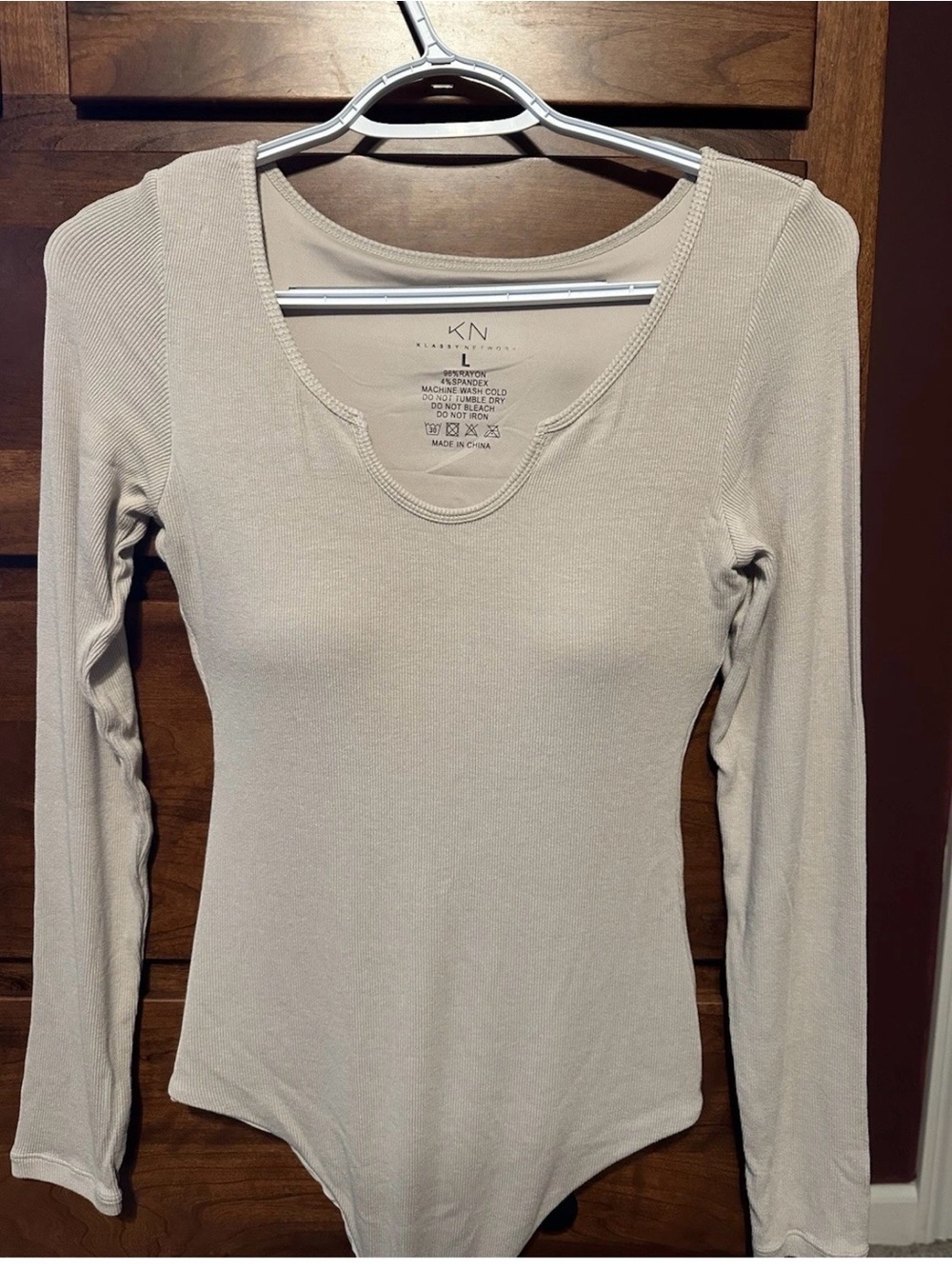 Klassy Network ribbed bodysuit with notch neck. Size large. Brand NEW, no tags.